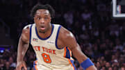 Nov 11, 2025; New York, New York, USA;  New York Knicks forward OG Anunoby (8) looks for an open teammate in the second quarter against the Memphis Grizzlies at Madison Square Garden. Mandatory Credit: Wendell Cruz-Imagn Images