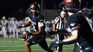 Lipscomb's Deuce Knight (2) looks upfield against IMG at Lipscomb's Reese Smith Football Field in Nashville, Tenn., Friday night, Aug. 18, 2023. IMG went on to win the game 35-10.