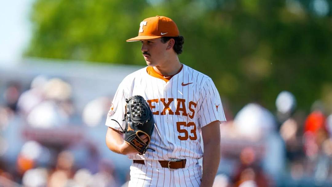 Texas Longhorns pitcher Luke Harrison stares into the box before throwing a pitch.