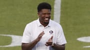 Aug 1, 2024; Canton, Ohio, USA;  2024 Professional Football Hall of Fame inductee Andre Johnson is introduced before the Chicago Bears play the Houston Texans at Tom Benson Hall of Fame Stadium. Mandatory Credit: Charles LeClaire-Imagn Images