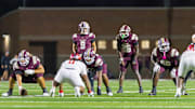 Humble Summer Creek quarterback Noah Spinks, center, led the Bullddogs to a win against Manvel on Friday. 