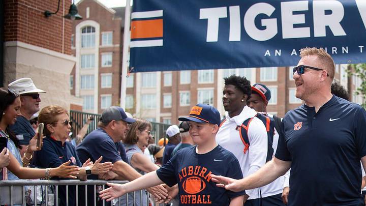 Auburn Tigers head coach Alex Golesh leads his team during Tiger Walk before Auburn Tigers A-Day spring game at Jordan-Hare Stadium in Auburn, Ala. on Saturday, April 18, 2026.