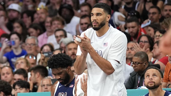 LILLE, FRANCE - JULY 28: Jayson Tatum #10 and Tyrese Haliburton #9 of Team USA celebrate during the game against the Serbian Men's National Team on July 28, 2024 at the Stade Pierre Mauroy in Paris, France.  (Photo by Garrett Ellwood/NBAE via Getty Images)