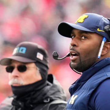 Nov 25, 2023; Ann Arbor, Michigan, USA; Michigan Wolverines interim head coach Sherrone Moore watches from the sideline during the first half of the NCAA football game against the Ohio State Buckeyes at Michigan Stadium. Mandatory Credit: Adam Cairns-USA TODAY Sports