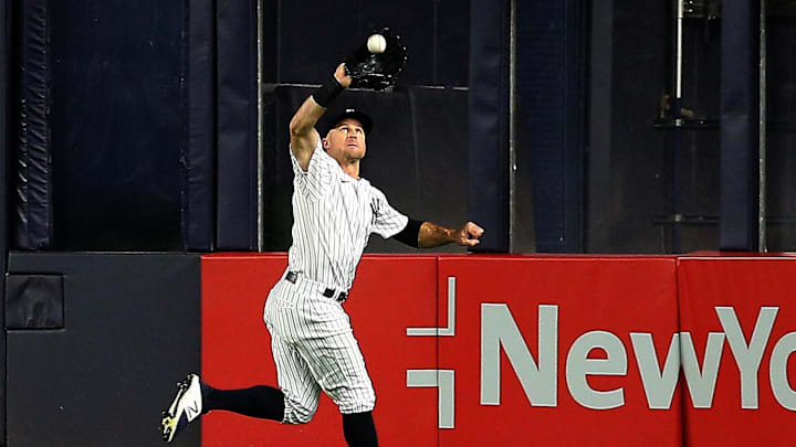 Oct 1, 2021; Bronx, New York, USA; New York Yankees center fielder Brett Gardner (11) makes a running catch against the Tampa Bay Rays during the ninth inning at Yankee Stadium. Mandatory Credit: Andy Marlin-Imagn Images Oct 1, 2021; Bronx, New York, USA; New York Yankees center fielder Brett Gardner (11) makes a running catch against the Tampa Bay Rays during the ninth inning at Yankee Stadium. Mandatory Credit: Andy Marlin-Imagn Images