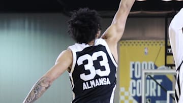 Feb 18, 2024; Indianapolis, Indiana, USA; Team ELY forward Babacar Sane (4) of the G League Ignite shoots the ball over Team BallIsLife forward Izan Almansa (33) G League Ignite during the G-League Next Up game at Indiana Convention Center. Mandatory Credit: Trevor Ruszkowski-Imagn Images