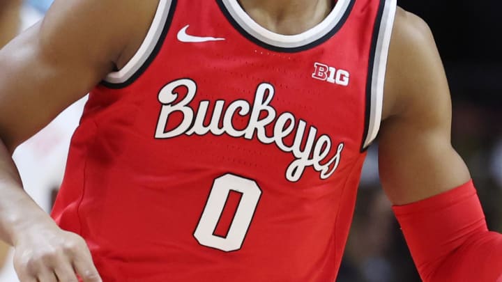 Feb 9, 2022; Piscataway, New Jersey, USA; Ohio State Buckeyes guard Meechie Johnson Jr. (0) dribbles up court  against the Rutgers Scarlet Knights during the first half at Jersey Mike's Arena. Mandatory Credit: Vincent Carchietta-USA TODAY Sports