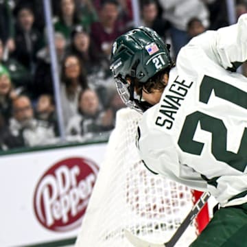 Michigan State's Red Savage takes a shot at the Ohio State goal in the second period of the Big Ten tournament game on Saturday, March 16, 2024, at Munn Arena in East Lansing.