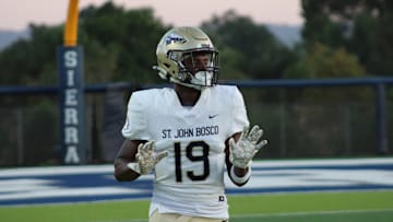 St. John Bosco’s Christian Davis warming up before taking on Sierra Canyon in Chatsworth, Calif. on Sept. 7, 2024.