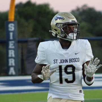 St. John Bosco’s Christian Davis warming up before taking on Sierra Canyon in Chatsworth, Calif. on Sept. 7, 2024.