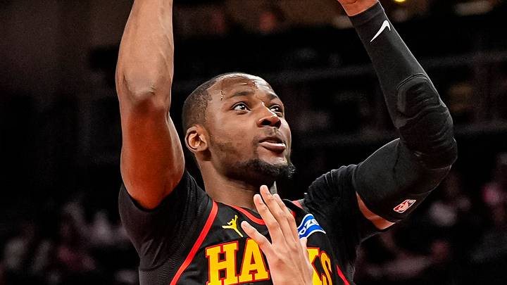 Feb 24, 2026; Atlanta, Georgia, USA; Atlanta Hawks forward Jonathan Kuminga (0) shoots over Washington Wizards guard Will Riley (27) during the second half at State Farm Arena. Mandatory Credit: Dale Zanine-Imagn Images