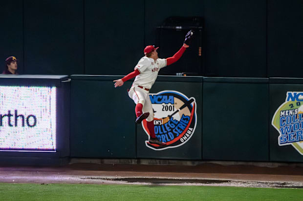 Max Buettenback robs a home run away from Minnesota. 