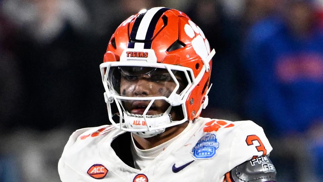 Dec 7, 2024; Charlotte, NC, USA; Clemson Tigers defensive end T.J. Parker (3) celebrates with linebacker Wade Woodaz (17) after a play during the second quarter against the Southern Methodist Mustangs in the 2024 ACC Championship game at Bank of America Stadium. Mandatory Credit: Bob Donnan-Imagn Images