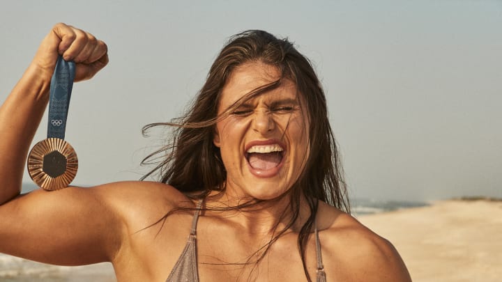 Ilona Maher was photographed by Ben Watts in Bellport, New York. Swimsuit by Haus of Pink Lemonaid.