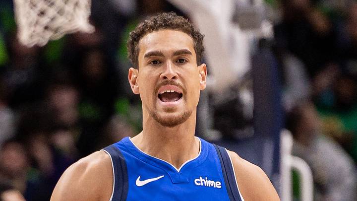 Mar 16, 2026; New Orleans, Louisiana, USA;  Former Boston Celtics and Dallas Mavericks forward/center Dwight Powell (7) slaps hands with forward Naji Marshall (13) against the New Orleans Pelicans during the second half at Smoothie King Center. Mandatory Credit: Stephen Lew-Imagn Images
