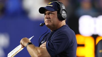 Oct 3, 2025; Provo, Utah, USA; West Virginia Mountaineers head coach Rich Rodriguez looks on during the first quarter of the game against the Brigham Young Cougars at LaVell Edwards Stadium. Mandatory Credit: Rob Gray-Imagn Images