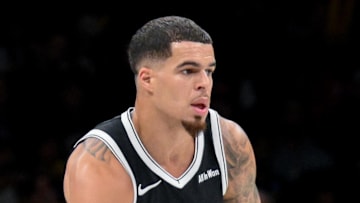 Nov 2, 2025; Brooklyn, New York, USA; Brooklyn Nets forward Michael Porter Jr. (17) brings the ball up court against the Philadelphia 76ers during the second half at Barclays Center. Mandatory Credit: John Jones-Imagn Images
