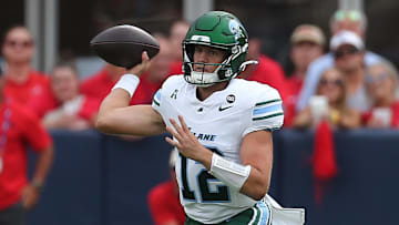 Sep 20, 2025; Oxford, Mississippi, USA; Tulane Green Wave quarterback Jake Retzlaff (12) passes the ball during the first quarter against the Mississippi Rebels at Vaught-Hemingway Stadium. Mandatory Credit: Petre Thomas-Imagn Images