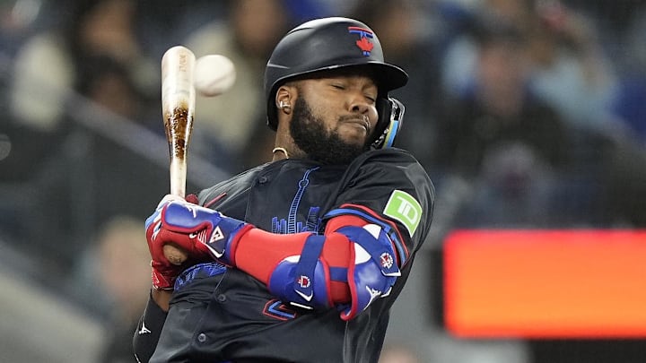 Toronto Blue Jays designated hitter Vladimir Guerrero Jr. (27) avoids an inside pitch from New York Mets pitcher Ryne Stanek (not pictured) during the eighth inning at Rogers Centre on Sept 9.