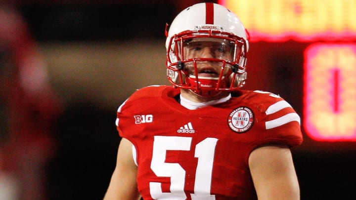 Oct 27, 2012; Lincoln, NE, USA; Nebraska Cornhuskers linebacker Will Compton (51) looks at the scoreboard during the game against the Michigan Wolverines at Memorial Stadium in the first half. Nebraska won 23-9.