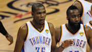 Jun 12, 2012; Oklahoma City, OK, USA; Oklahoma City Thunder small forward Kevin Durant (35) and guard James Harden (13) and point guard Derek Fisher (37) walk off the court against the Miami Heat during the second quarter of game one in the 2012 NBA Finals at Chesapeake Energy Arena. Mandatory Credit: Jerome Miron-Imagn Images