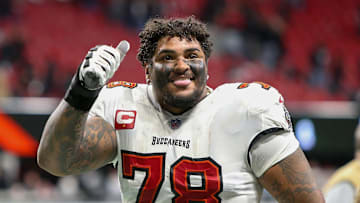 Tampa Bay Buccaneers offensive tackle Tristan Wirfs celebrates after a victory against the Atlanta Falcons.