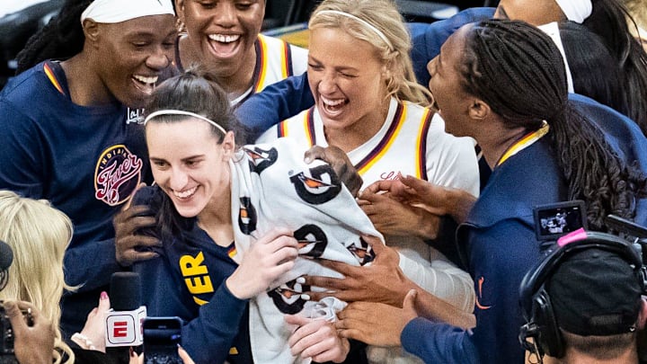 The Indiana Fever celebrate Indiana Fever guard Caitlin Clark during a preseason against the Brazil national team. The Indiana Fever celebrate Indiana Fever guard Caitlin Clark during a preseason against the Brazil national team.