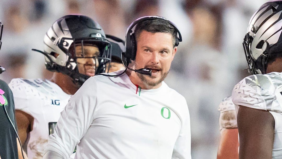 Oregon head coach Dan Lanning talks to players in the fourth quarter as the Oregon Ducks face the Penn State Nittany Lions on Sept. 27, 2025, at Beaver Stadium in University Park, Pennsylvania.