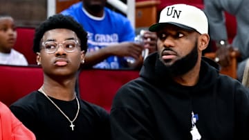 Los Angeles Lakers forward LeBron James and son Bryce James (left)