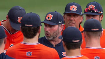 Auburn Tigers head coach Butch Thompson talks with his team before Auburn takes on Florida State during the NCAA regional baseball tournament at Plainsman Park in Auburn, Alabama, on Saturday, June 4, 2022.