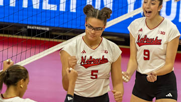Nebraska middle blocker Rebekah Allick celebrates against Oregon. Allick finished with five blocks as the Huskers limited Oregon to its second-lowest hitting percentage this season.