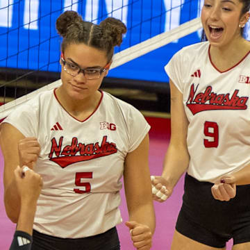 Nebraska middle blocker Rebekah Allick celebrates against Oregon. Allick finished with five blocks as the Huskers limited Oregon to its second-lowest hitting percentage this season.