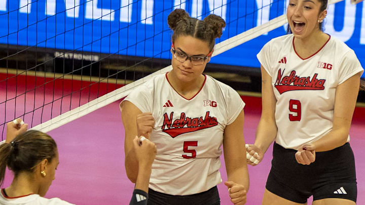 Nebraska middle blocker Rebekah Allick celebrates against Oregon. Allick finished with five blocks as the Huskers limited Oregon to its second-lowest hitting percentage this season.
