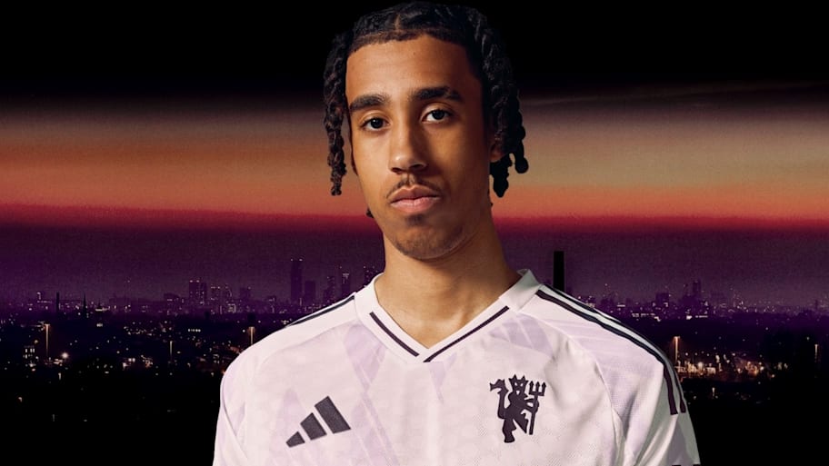 Leny Yoro modeling Manchester United's away shirt for the upcoming season. | Manchester United, adidas