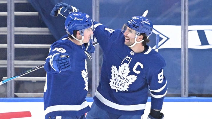 Jan 26, 2022; Toronto, Ontario, CAN; Toronto Maple Leafs forward Mitch Marner (16) celebrates with forward John Tavares (91) after scoring against the Anaheim Ducks in the first period at Scotiabank Arena. Mandatory Credit: Dan Hamilton-USA TODAY Sports