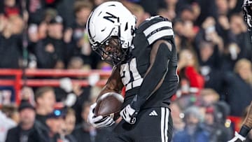 Nebraska running back Emmett Johnson, who 11 games into 2025 has combined for 1,582 all-purpose yards and 14 touchdowns, after scoring a touchdown against USC. 