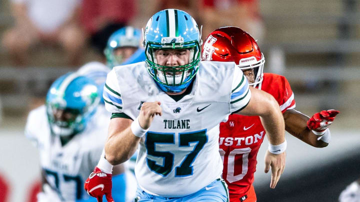 Oct 8, 2020; Houston, Texas, USA;  Tulane Green Wave long snapper Ethan Hudak (57) runs down field after the snap during the second quarter against the Houston Cougars at TDECU Stadium.   