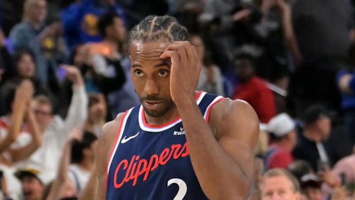 Apr 15, 2026; Inglewood, California, USA; Los Angeles Clippers forward Kawhi Leonard (2) leaves the court after being defeated by the Golden State Warriors during the play-in rounds of the 2026 NBA Playoffs at Intuit Dome. Mandatory Credit: Jayne Kamin-Oncea-Imagn Images