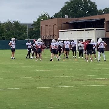 Alabama football players at practice.