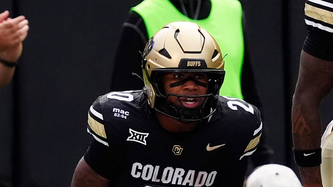 Aug 29, 2025; Boulder, Colorado, USA; Colorado Buffaloes running back Dekalon Taylor (20) celebrates his touchdown reception in the first quarter against the Georgia Tech Yellow Jackets at Folsom Field. 
