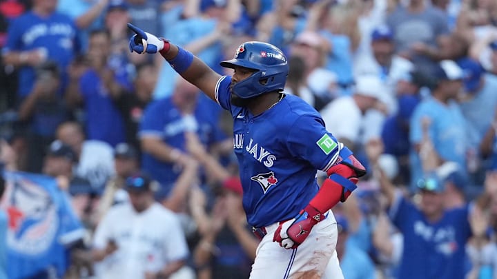 Toronto Blue Jays first baseman Vladimir Guerrero Jr. hit the first postseason grand slam in franchise history during a 13-7 win over the New York Yankees in Game 2 of the American League division series. Toronto Blue Jays first baseman Vladimir Guerrero Jr. hit the first postseason grand slam in franchise history during a 13-7 win over the New York Yankees in Game 2 of the American League division series.