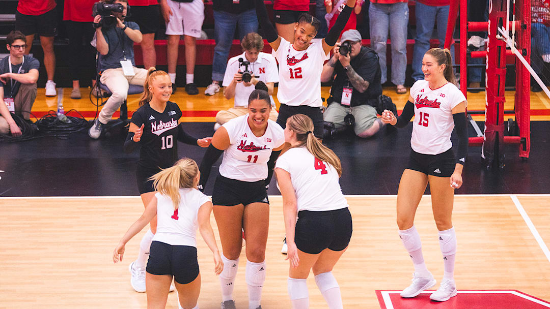 Nebraska volleyball players celebrate during a 4-0 win over South Dakota State at Ord High School on May 3, 2025. This year, the Huskers will play their annual Greater Nebraska spring match in Chadron. | Nebraska Athletics