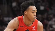 Toronto Raptors guard Scottie Barnes controls the ball against the Cleveland Cavaliers.