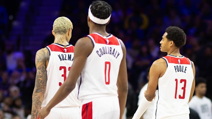 Nov 6, 2023; Philadelphia, Pennsylvania, USA; Washington Wizards Kyle Kuzma (33) and Bilal Coulibaly (0) and Jordan Poole (13) and Daniel Gafford (21) and Tyus Jones (5) during the third quarter against the Philadelphia 76ers at Wells Fargo Center. Mandatory Credit: Bill Streicher-Imagn Images