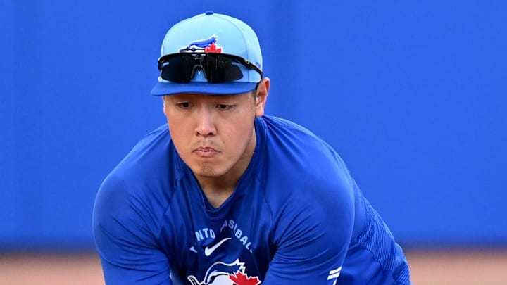 Feb 19, 2026; Dunedin, FL, USA; Toronto Blue Jays infielder Kazuma Okamoto (7) fields a ground ball during spring training at Bobby Mattick Training Center at Englebert Complex. Mandatory Credit: Jonathan Dyer-Imagn Images