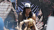Jun 24, 2025; Oklahoma City, OK, USA; Oklahoma City Thunder forward Jaylin Williams lets fans touch the Larry O'Brien Championship Trophy during the Oklahoma City Thunder Champions parade. Center. Mandatory Credit: Alonzo Adams-Imagn Images