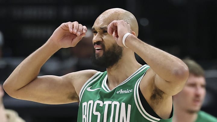 Feb 4, 2026; Houston, Texas, USA; Boston Celtics guard Derrick White (9) reacts after a play during the third quarter against the Houston Rockets at Toyota Center. Mandatory Credit: Troy Taormina-Imagn Images