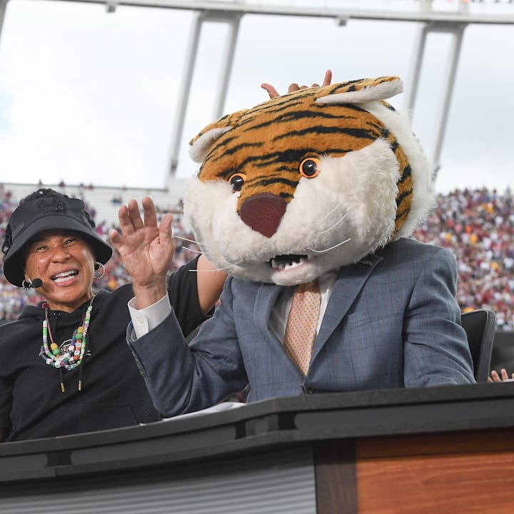 Dawn Staley smiles after Lee Corso picked LSU and she picked South Carolina,during the ESPN College GameDay show. 