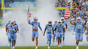 North Carolina running on the field before its game vs. Stanford; Nov. 8, 2025