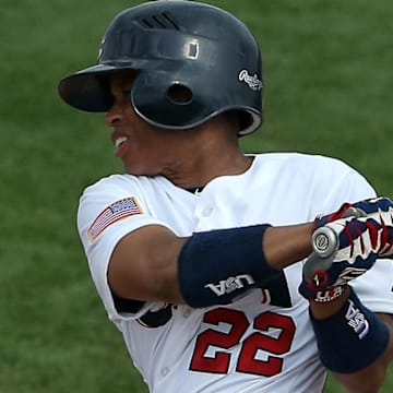 Jul 20, 2015; Toronto, Ontario, CAN; United States left fielder Tamara Holmes (22) hits an RBI double in the third inning against Venezuela during the 2015 Pan Am Games at Ajax Pan Am Ballpark. Holmes, a three-time gold medalist, has been announced as a manager for the Rockford Peaches in the 2025 All-American Women's Baseball Classic, powered by USA Baseball.